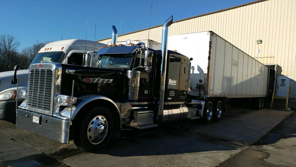 Roane Transportation truck backed into a loading dock with a less than truck load.